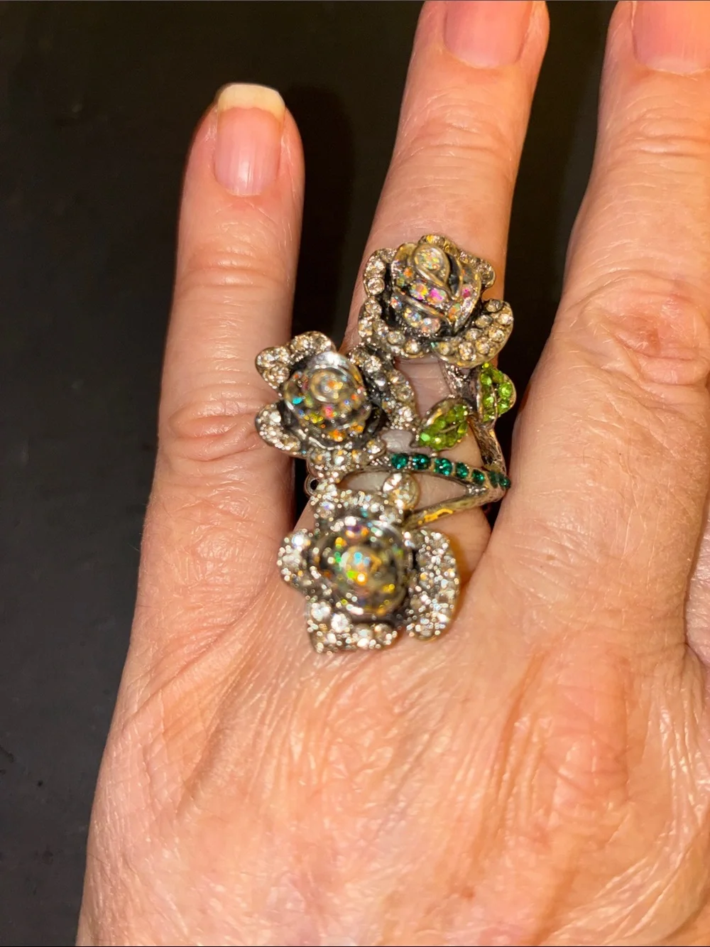 Featuring Three Crystal Rose Blooms Cocktail Stretch Ring with Green Accents